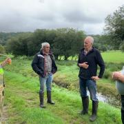 FUW Meirionnydd members at the Afon Croesor flood banks when the plea for repairs was made last year.