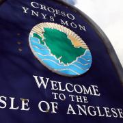 Welcome to Anglesey sign