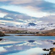 Wales, Snowdon, 11 May, 2015 : Snowy Snowdonia mountains in winter ..