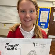 A pupil at Ysgol y Tywyn in Caergybi who took part in the 'Draw Yourself as a Superhero' activity. Photo: Kate Cashmore