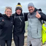 Mickey Thomas (middle) at the Snowdon summit. PIC: @therealMickeyT/Twitter.