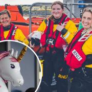 Dwynwen, Ellie and Georgi made history at Moelfre lifeboat station by being on the first ever shout involving an all-female crew. Photo: Will Aron. Inset: An inflatable unicorn. Image: PA Wire