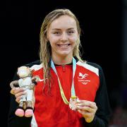 Wales’ Medi Harris with her bronze medal after the Women’s 100m Backstroke Final. Photo: PA Wire/Martin Rickett