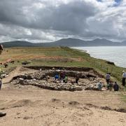 Dan Amor Gwynedd Archaeological Trust\'s education and outreach officer surveys the dig at Dinas Dinlle Picture Dale Spridgeon
