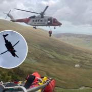 The man being lifted to safety. Photo: Ogwen Valley Mountain Rescue/Ric Potter