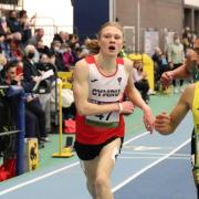 Osian Perrin at the BoXX United World Indoor Tour in Manchester in 2022, where he broke his own under-20 indoor 3,000m record