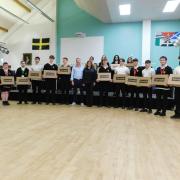 Ysgol Friars sixth form pupils with Susan Ashworth and Mark Watkin Jones