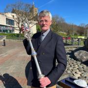Councillor Mark Roberts with the Ceremonial Mace.