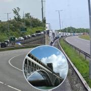 Traffic leading up to the bridge on May 23 and the empty stretch of the A55 and inset, Britannia Bridge.