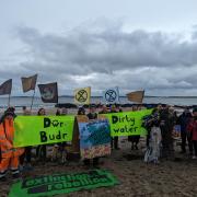 Protesters at Rhosneigr Beach on August 5