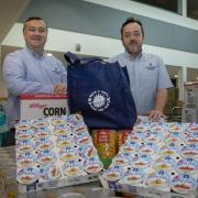 Mark Lawton, Harlech Foodservice Commercial Director, and Mark Keats, Account Manager, with a consignment of food for Anglesey schools.