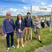 Virginia Crosbie MP with Rail Minister Huw Merriman and local activists at Ty Croes Railway Station