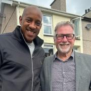 Dion Dublin with a Dafydd Hardy Estate Agents member of staff.