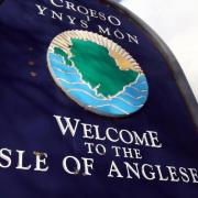 Welcome to Anglesey sign