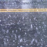 Generic image of a wet road surface.