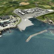 An impression of the proposed Wylfa power station with views from the sea.