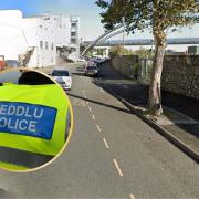 Victoria Road, Holyhead. Inset: North Wales Police jacket