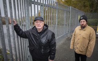 Still locked out...ex-striker Raymond Roberts and his grandson, Dion Wyn, who’s made a documentary to mark the 20th anniversary of the historic Friction Dynamics dispute